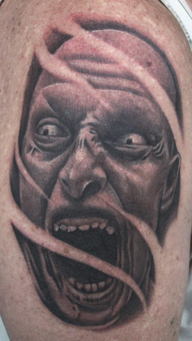 Aric Taylor The Dark Horse - Scary Face on arm